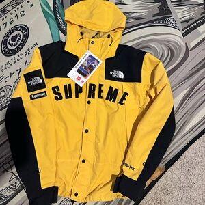 The North Face Supreme Yellow and Black Raincoat